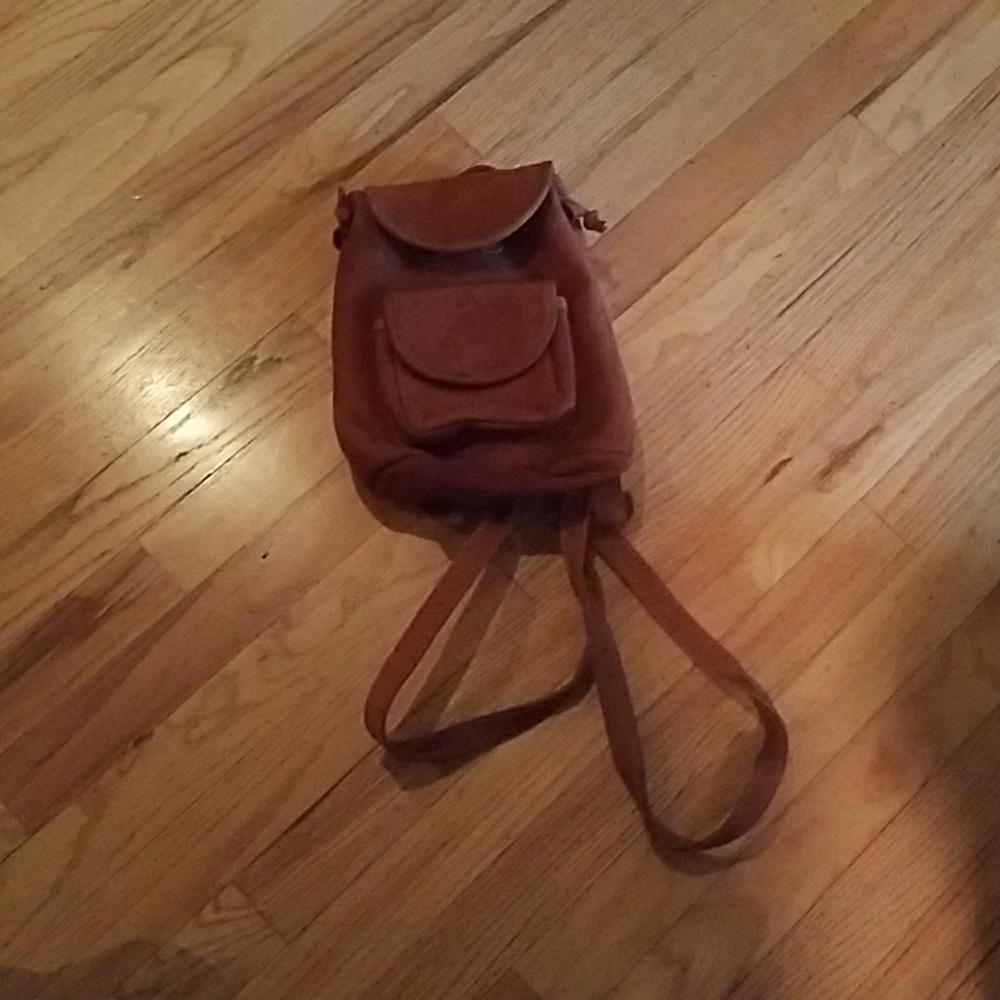 Vintage camel colored mini backpack